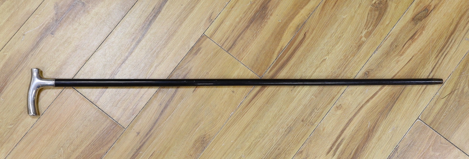 A George V silver mounted walking stick, 88cm tall